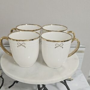 Elegant White Porcelain Mugs with Gold Trim - Set of 4